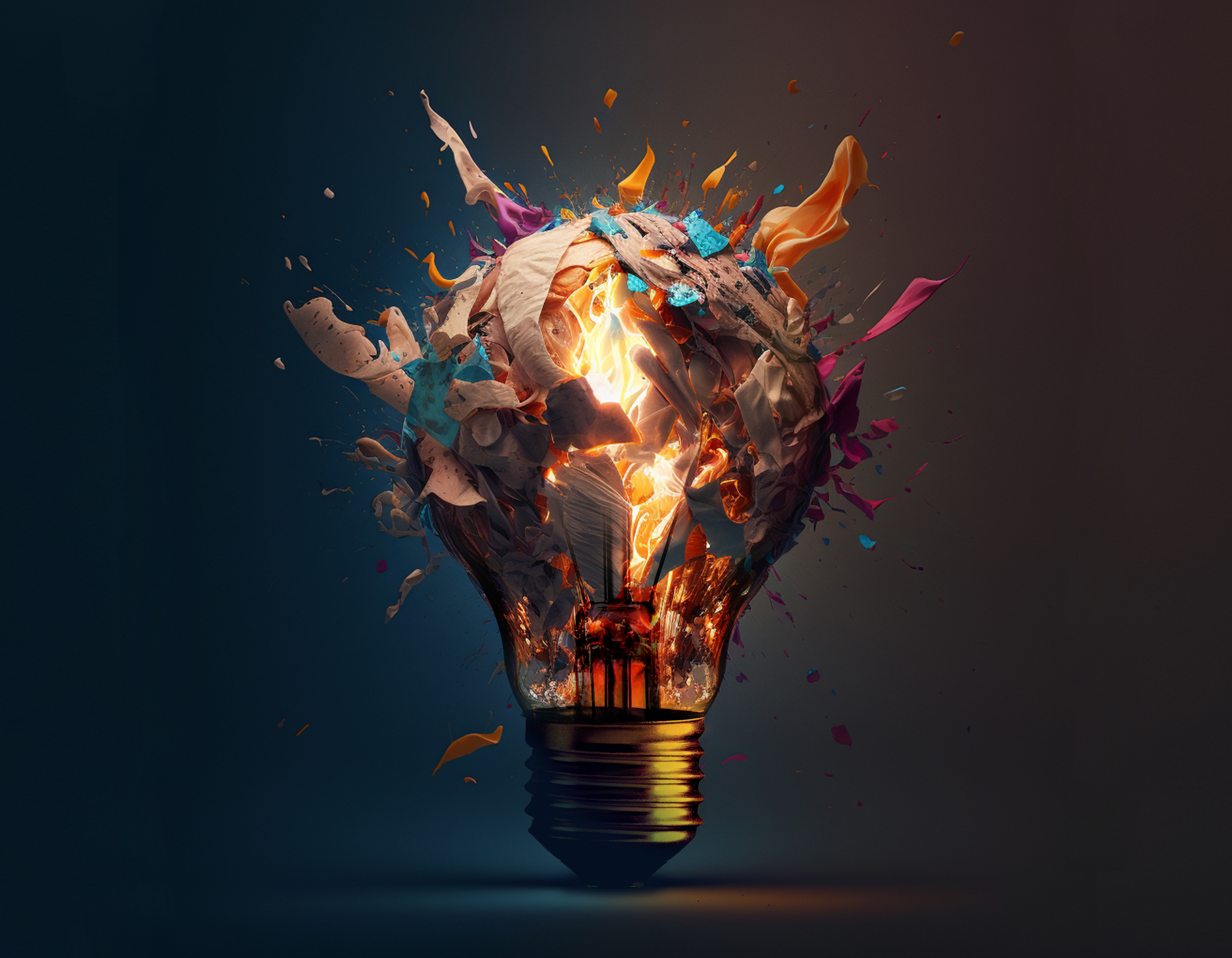 Creative light bulb explodes with splashes of multi-colored paint on a dark background.